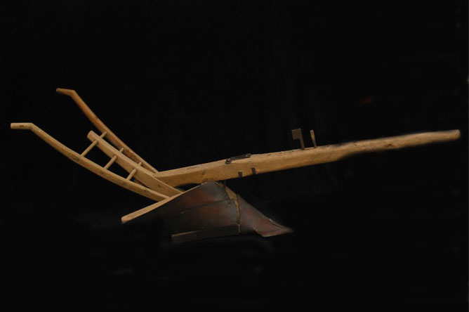 Late 19th century wheel plow, used to till the soil