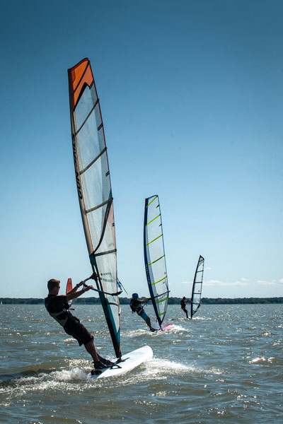 Three windsurfers on Lake Saint-Pierre